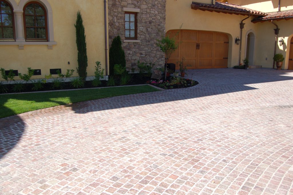 Alamo, CA. Copper Mt Porphyry Driveway. The finished entranceway leading to the garage.